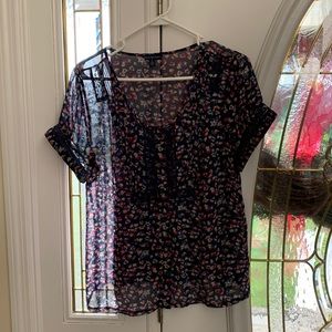 Beautiful blouse! Such delicate flowers, lace and details on the bodice & sleeve